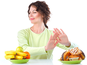 portrait of woman refusing junk foods