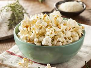 Homemade Rosemary Herb and Cheese Popcorn in a Bowl