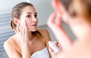 Woman Applying Wrinkle Serum